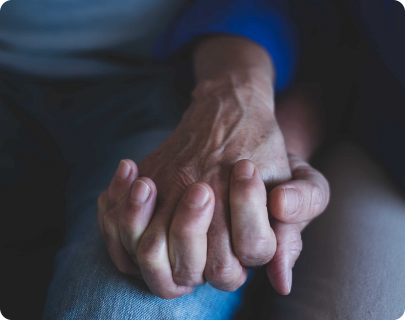 Parkinson's patient gift idea where a senior man is preparing breakfast independently at home.