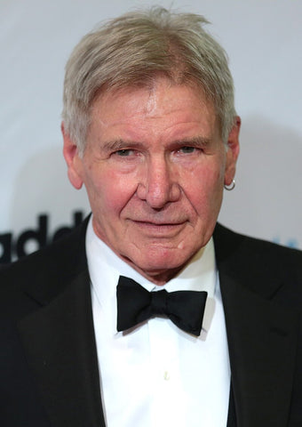 Headshot of Harrison Ford in a suit
